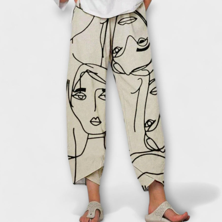 "Nahia - Pantaloni din In" can be rewritten as "Nahia - Pantaloni din Fibre Naturale" or "Nahia - Pantaloni din In Premium".
