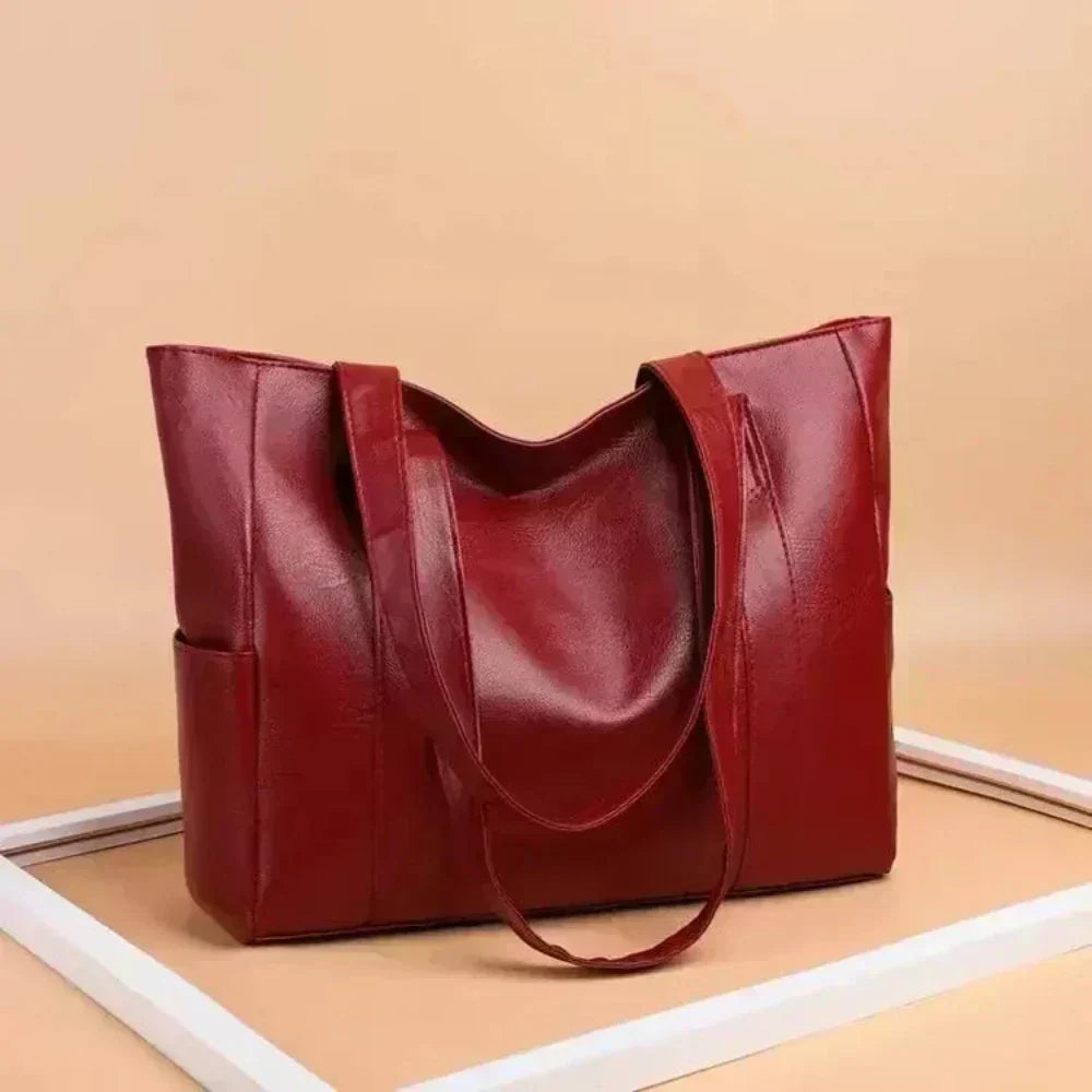 Lucia — Geantă de mână elegantă cu design minimalist